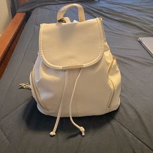 Cute backpack , small compact but everything fits.